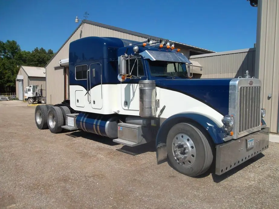Blue and white Peterbilt tractor painted in the Spies Painting shop