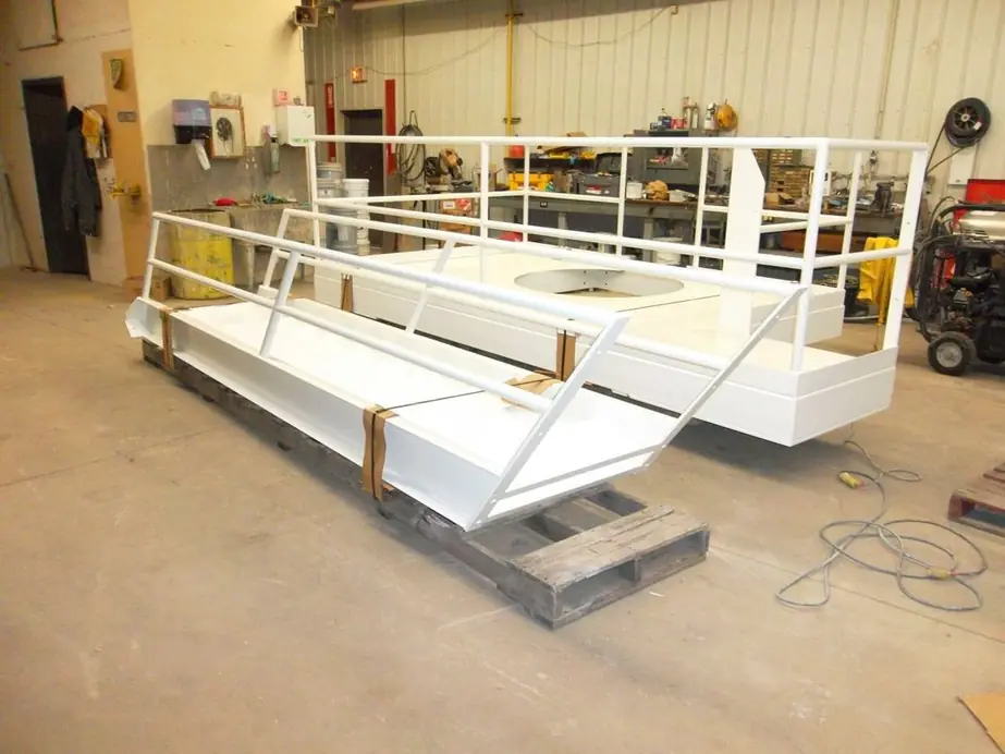 White fabricated steel platform painted in the Spies shop