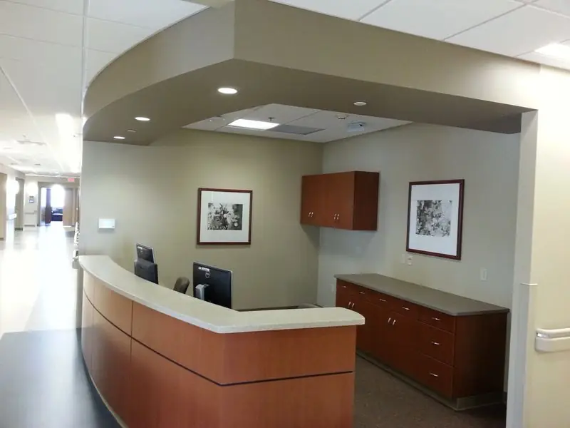 Curved reception desk in a finished interior
